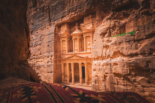Ancient Petra view of The Treasury (Al Khazneh) from Cliff with Bedouin Blankets