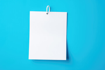 White note paper on panoramic blue background