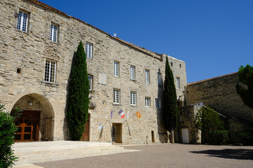 Le Castellet, France - August 14, 2023: historical building facades of the village Le Castellet - 650450719