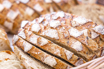 Rye loaf slices. Fresh bread in the bakery. Rye bread, cut into slices. Close-up, selected focus