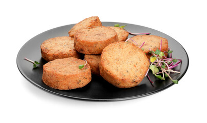 Plate of delicious vegan cutlets and microgreens isolated on white