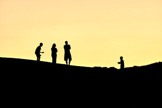 Hilltop Harmony: Family Silhouettes