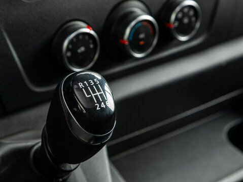 Novosibirsk, Russia - September 11  , 2023: Renault Master,  Close up of the manual gearbox transmission handle. Accelerator handle and buttons in a new car. .