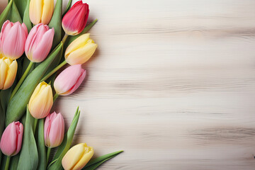 Colorful blooming spring flowers Fresh tulips on soft gray wooden table with empty space for text created with Generative AI Technology