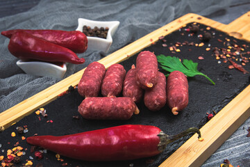 Small smoked sausages with a spicy pepper flavor.