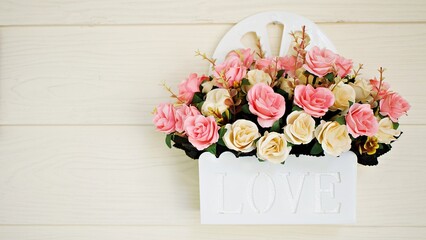 Colorful decoration artificial flower with vintage tone ,valentine day ,wedding card design ,Bouquet plastic rose flowers with old style for background or celebration card ,Romantic decoration 