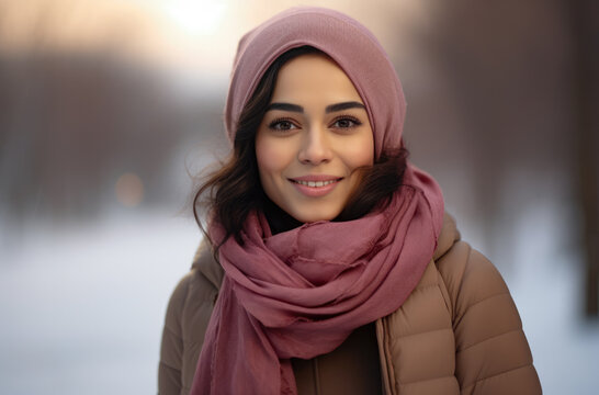 Young woman with a scarf in a winter scene