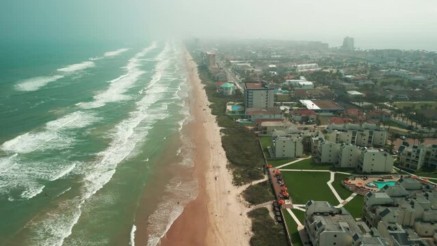 Drone wide shot of South Padre Island, TX morning time