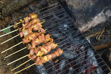 Close up shot of roasted goat satay, a popular dish in Indonesia.