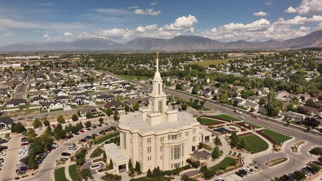 Aerial religion Payson Utah LDS Temple overhead pull. The Church of Jesus Christ of Latter-day Saints, LDS or Mormon religion. Fast growing christian religious groups. Headquartered in Salt Lake City.
