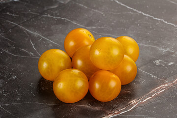 Ripe tasty yellow cherry tomato