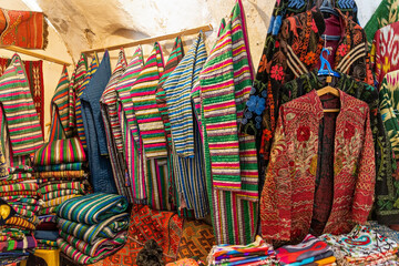 Uzbek national clothes in a shop. Bukhara, Uzbekistan