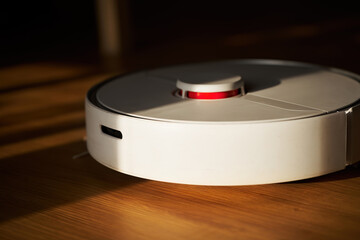 Smart Home Cleaning and housekeeping. Robotic vacuum cleaner. Sustainable housework and technology...