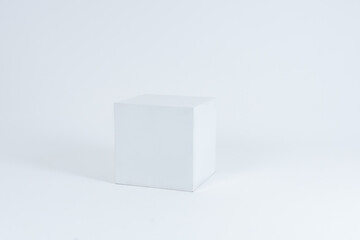 white cube on a cyclorama, white cube on a white background