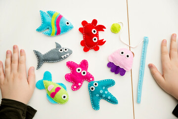 Hand made stuffed felt toy. Fishing rod with magnet and fishes or other sea animals. Different...