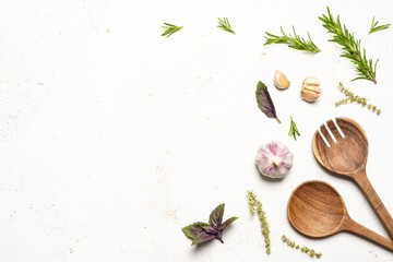 Food background with spices, herbs and utensil on kitchen table