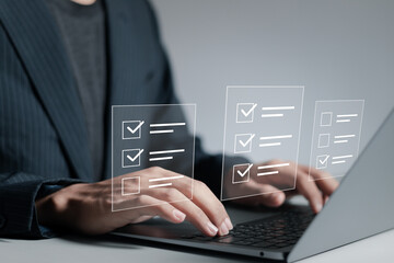 Online survey form concept, Businessman makes checklist and takes an online assessment test on...