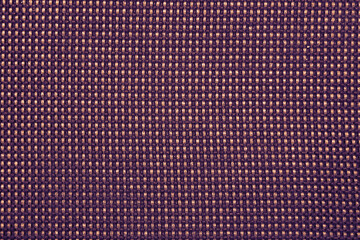 Textile purple fabric upholstery of an office chair as a texture, pattern, background