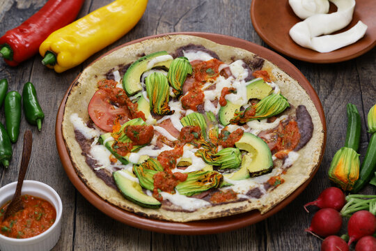 homemade open face vegetable tlayuda(before charcoal grilling), Mexican pizza