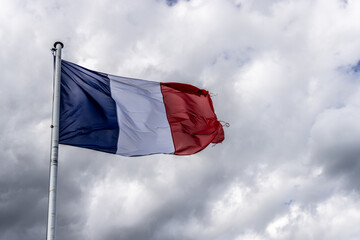 French flag fluttering in the wind - 650607146