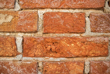 Brick wall. Ancient brickwork. Red brick background.