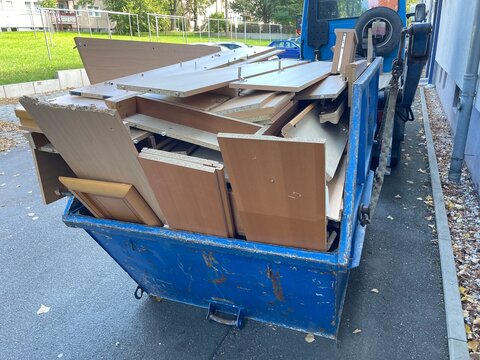 Apartment clearance bulky waste on a container