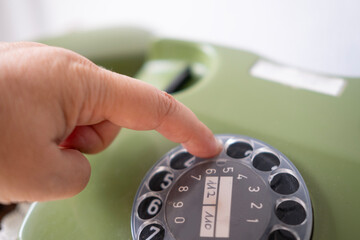 female hand dialing number, Classic Rotary Retro Telephone, Connecting with Past, calls helpline,...