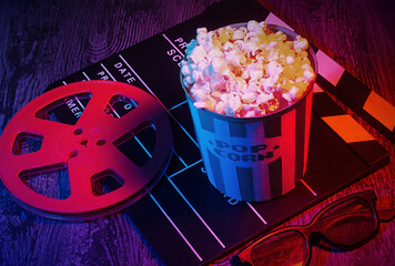 Cinema movies concept background, with a pop corn bucket, 3D glasses. Movie night template, table...