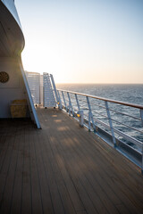 Cruise ship ship deck during sunset, sunrise, vertical shot