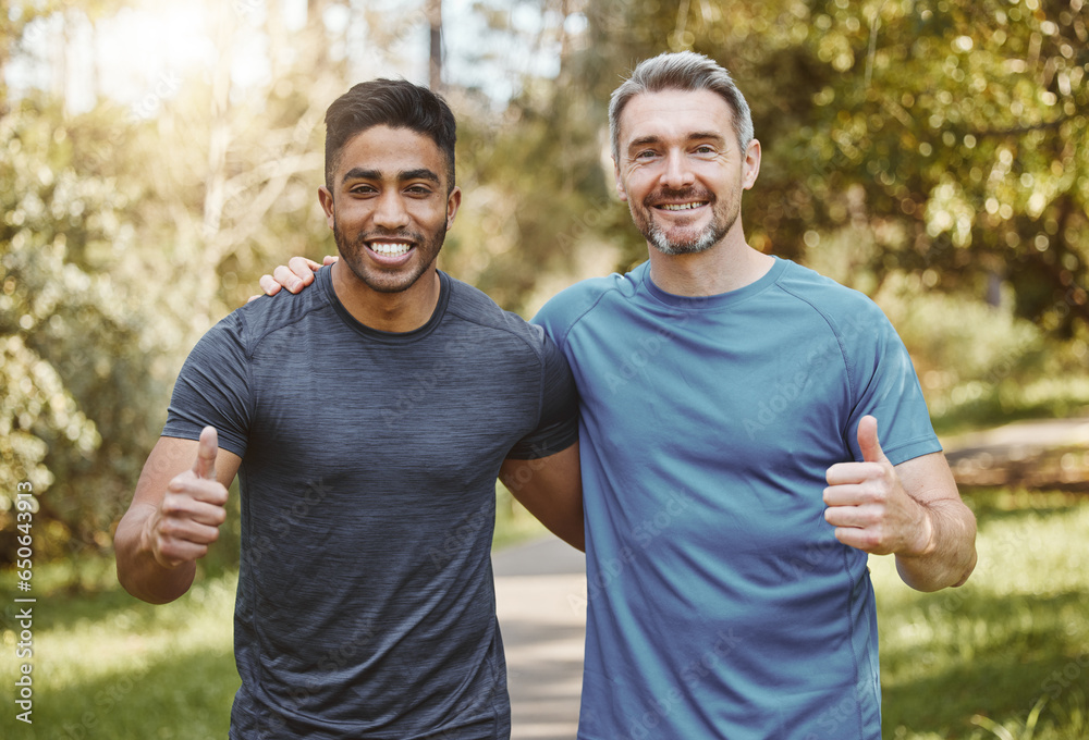 Wall mural Happy man, portrait and friends in nature with thumbs up for fitness, training or workout together. Male person, athlete or runners smile and like emoji, yes sign or OK in success or outdoor exercise