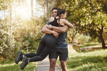 Fitness, spinning and couple hug in park outdoors for exercise, training and running for cardio...