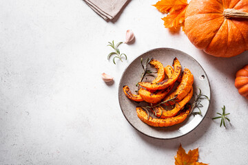 Grilled pumpkin slices with garlic and herbs
