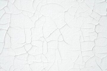 Cracked white paint on the wall, wall texture - 650649309