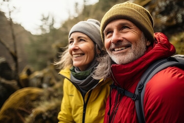 Mature couple traveling, embracing the beauty of nature on a picturesque hike