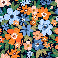 Beautiful floral pattern in small abstract flowers. Small blue and orange flowers. Dark blue background. Ditsy print. Floral seamless background. Liberty template for fashion prints. Stock pattern.