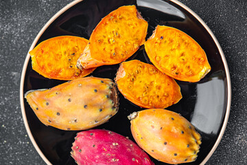 prickly pear exotic fruit figues de barbarie appetizer meal food snack on the table copy space