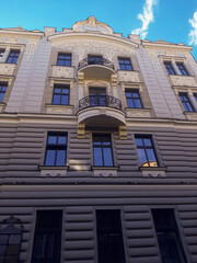Obraz premium house in Art Nouveau style on top of a tower modeling beautiful woman's face, Bielsko Biala, Poland