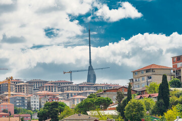 Fototapeta premium camlica mosque and tower on a cloudy day with houses and constructions