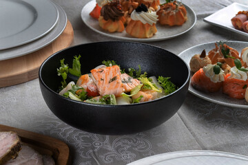 Salmon steak, squid, shrimp with salad to the New Year's table. Top view, macro