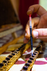 Grafting or queen bee rearing or production of royal jelly background photo