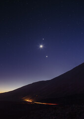 starry night sky over mountain © Ilia