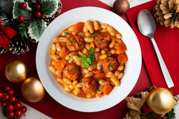 White bean stew with chorizo. Traditional dish of Spanish gastronomy from the Asturias region in...