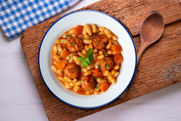 White bean stew with chorizo. Traditional dish of Spanish gastronomy from the Asturias region in the north of the country.