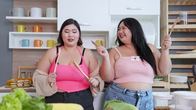 Chubby plus size Asian woman want to lose fat choose healthy foods fruits and vegetables. Good health food and diet. weight lose, balance, control, calories, routines, diet healthy concept.
