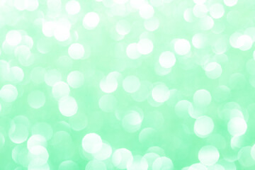 Obraz premium Bright glowing green bokeh