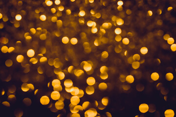 Glittering stars of gold bokeh