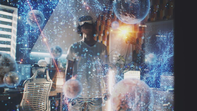Man uses augmented reality goggles and wireless controllers at home. 3D computer graphics visualization of holographic immersive metaverse big data and virtual cyberspace. Futuristic VFX animation.
