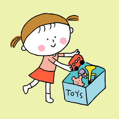 おもちゃ箱におもちゃを片付ける子ども1