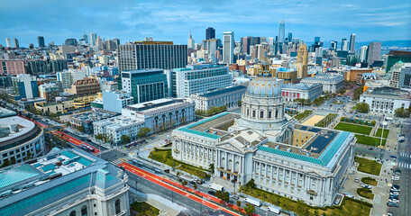 Aerial of government buildings with focus on city hall and view of San Francisco skyscrapers