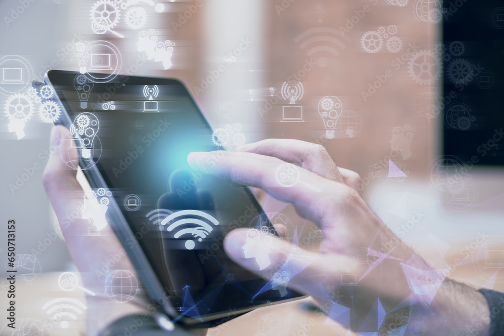 Poster close up of male hand pointing at tablet with glowing digital business interface with cogwheels and 
